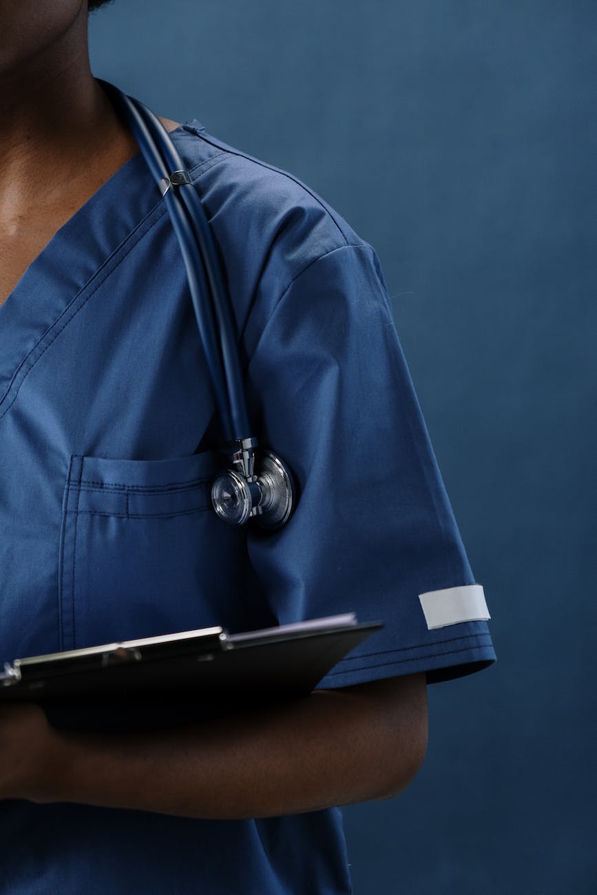 a stethoscope on a medical professional s shoulder